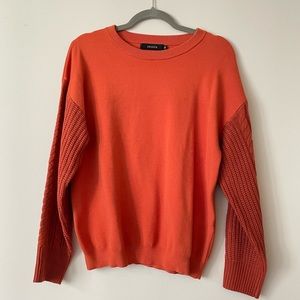 Orange sweater